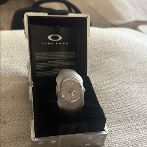 Authentic time bomb silver Oakley  Men's Watch